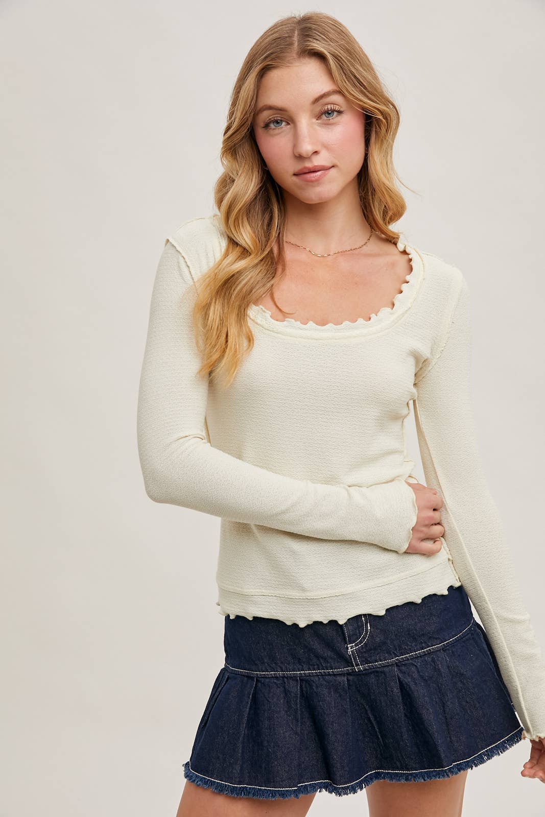Ruffled Scoop Neck Exposed Seam Long Sleeve Top